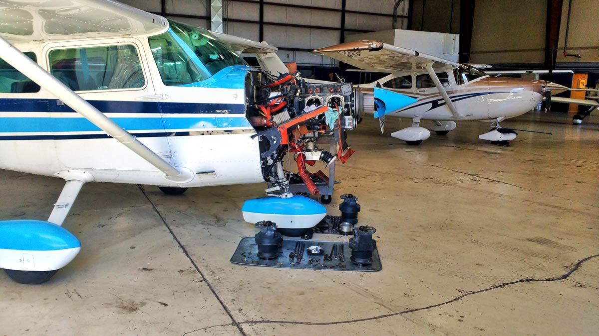 Aircraft with visible engine for maintenance
